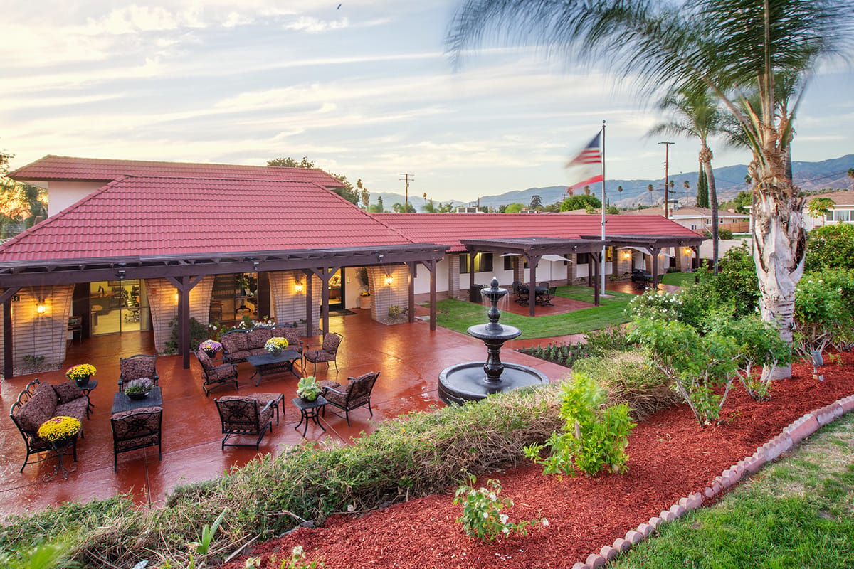 Outdoor view of the facility with gardens and seating