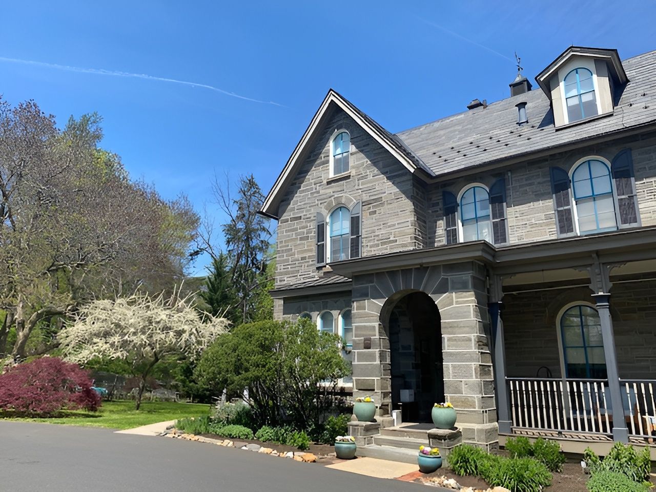 Exterior view of a senior care facility with gardens