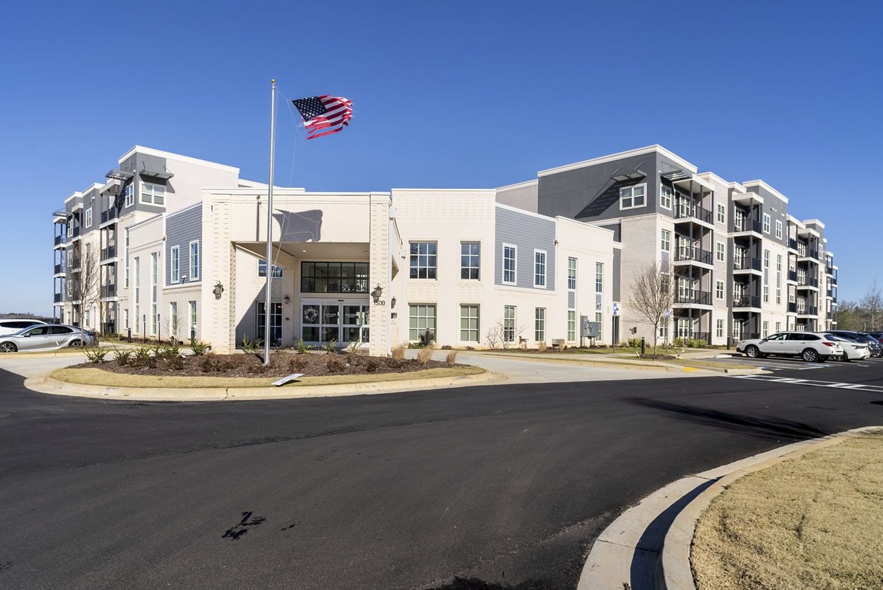 Exterior view of Outlook Gwinnett facility with flag