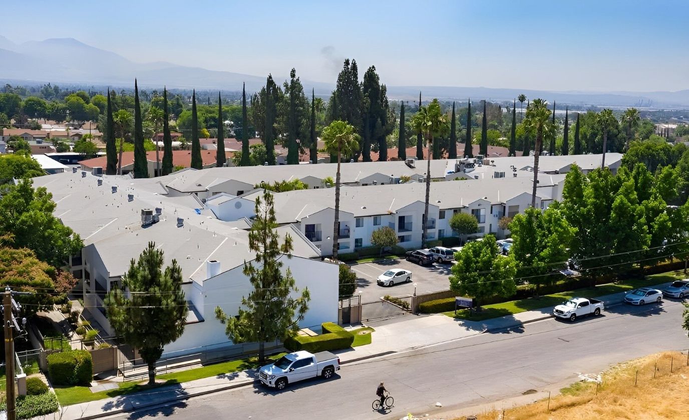 Aerial view of Parkside Senior Apartments with surrounding greenery