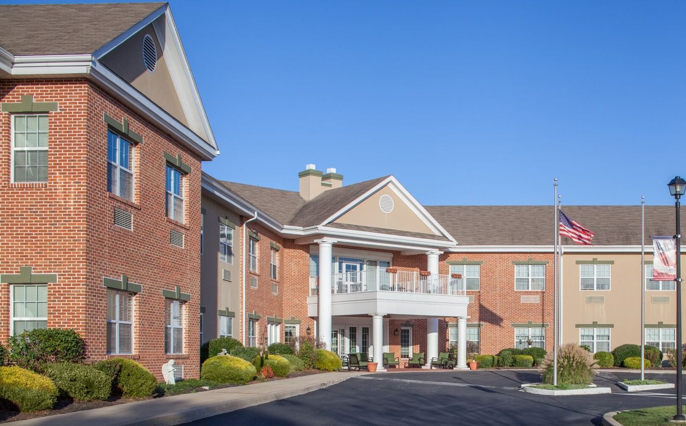 Exterior view of Sanatoga Court building with landscaping