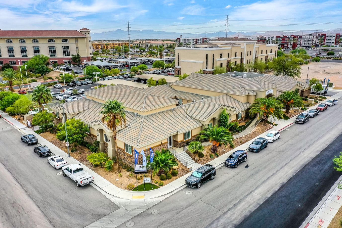 Aerial view of the assisted living facility's exterior with landscaping
