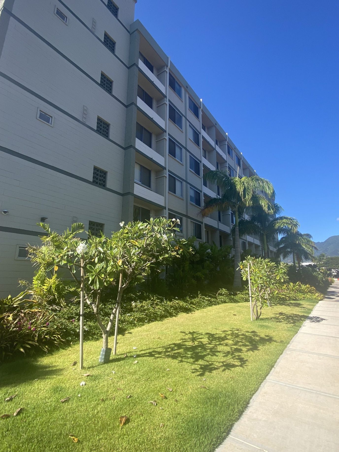Exterior view of the building with landscaped gardens