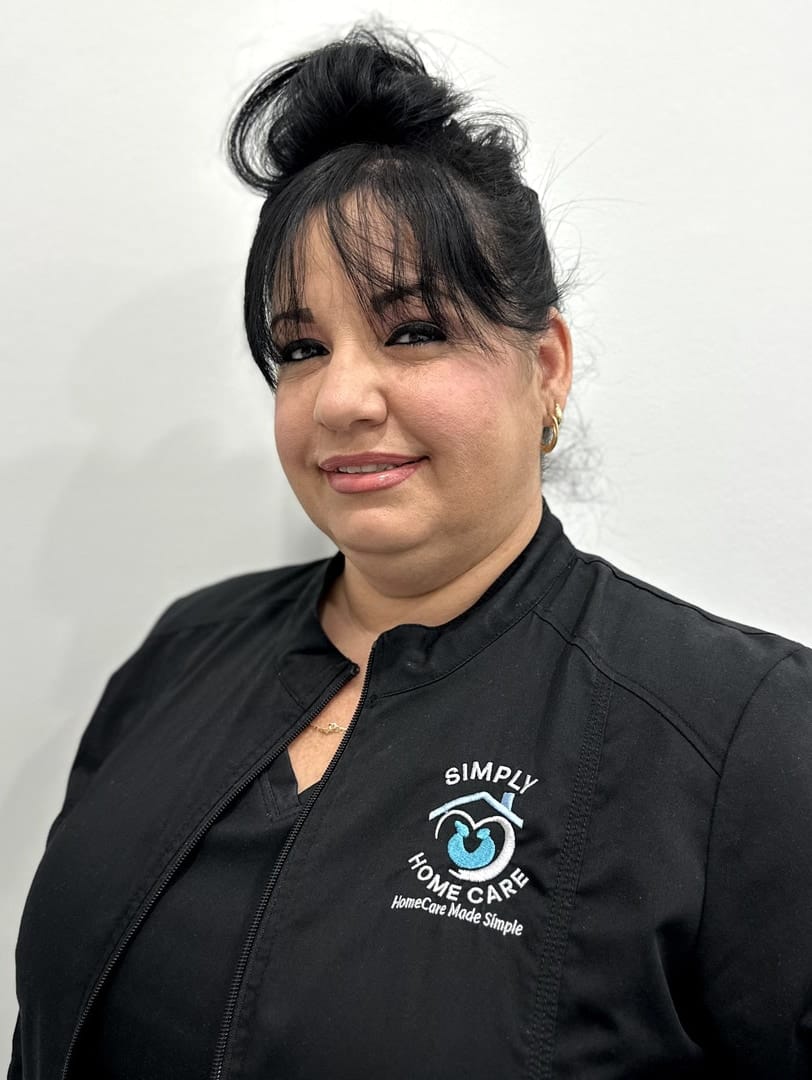 Staff member in a uniform with logo