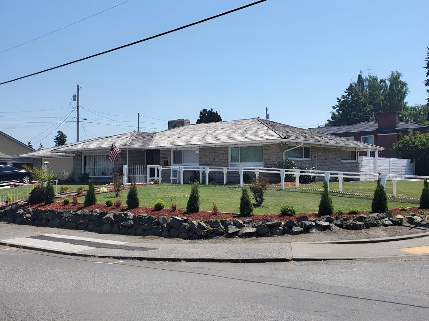 Exterior view of the facility with landscaped garden