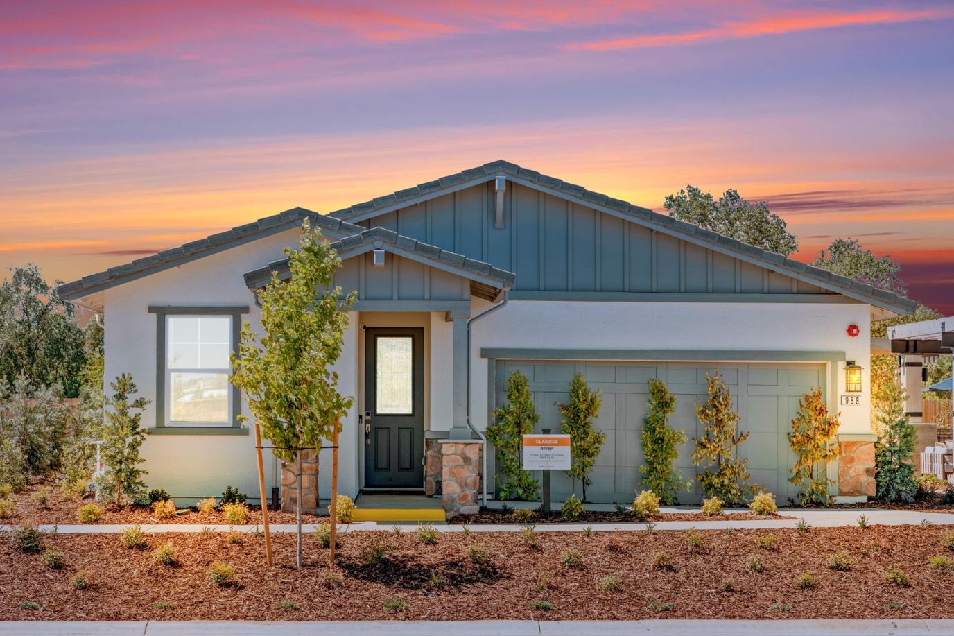 Exterior view of a residential facility at sunset