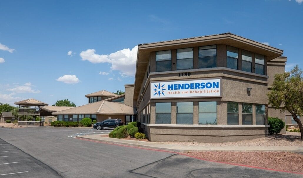 Exterior view of Henderson Health and Rehabilitation building with logo