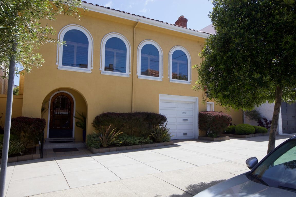 Front exterior of a vibrant facility with landscaped entrance