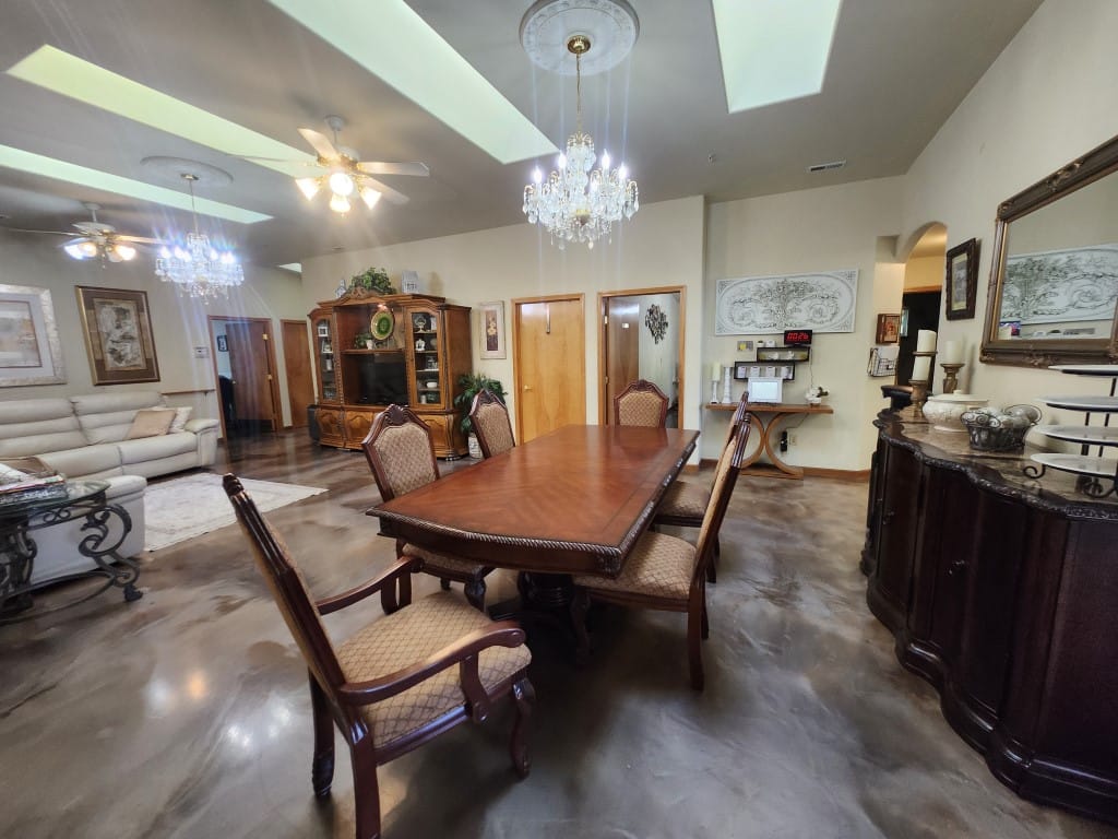 Interior common area with dining table and chairs
