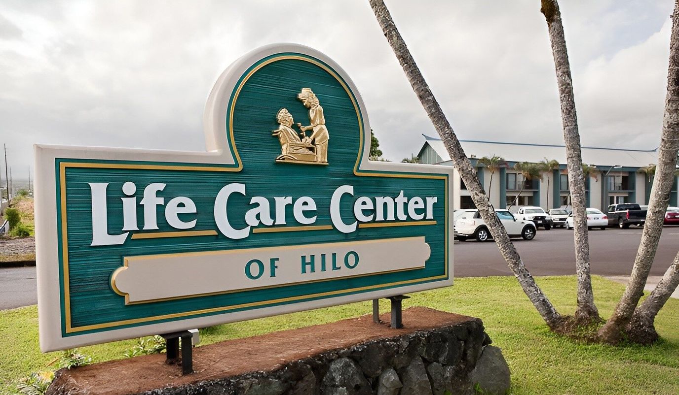 Facility logo in front of the building
