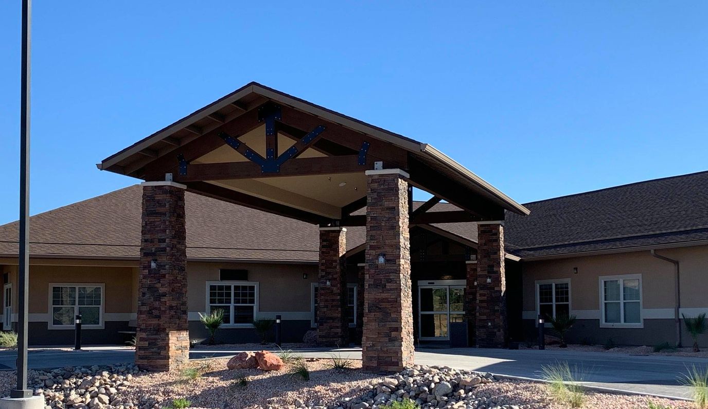 Entrance of Mesa Valley Estates with wooden structure