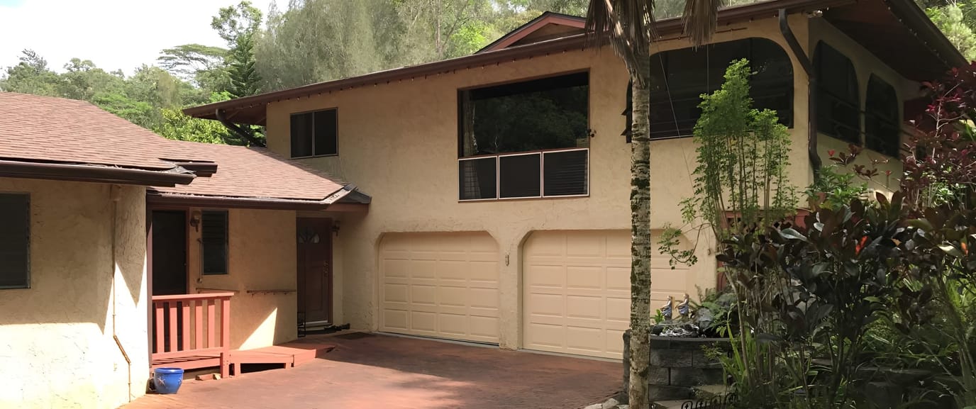 Exterior view of Mililani Care Home with gardens
