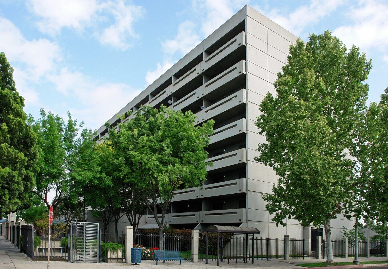 Exterior view of a multi-story building with trees