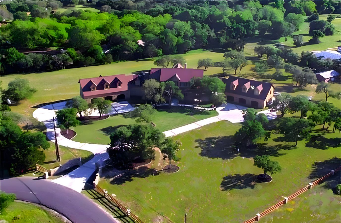 Aerial view of Starwood Manor surrounded by greenery