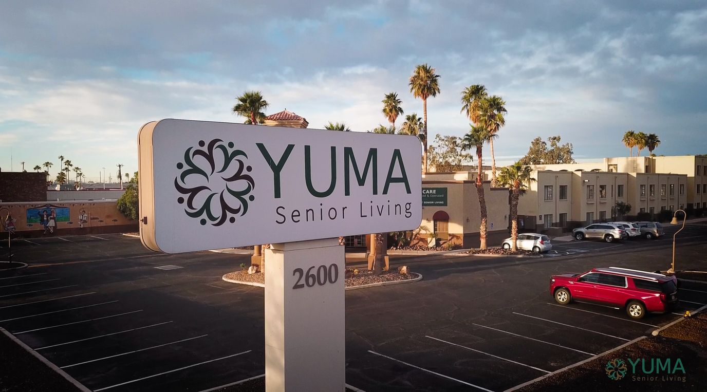 Sign for Yuma Senior Living outside the facility