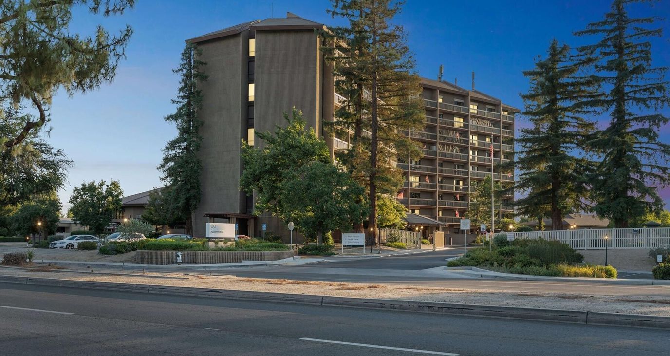 Exterior view of the Rosewood facility surrounded by trees