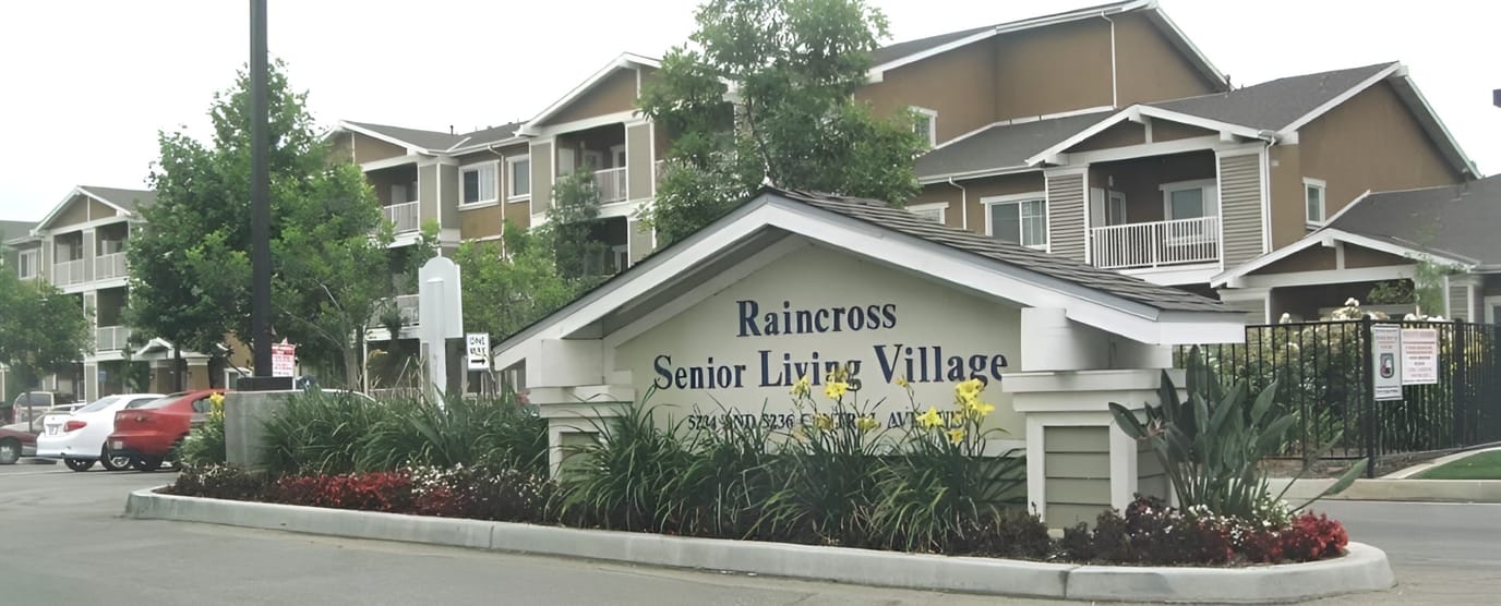 Exterior view of Raincross Senior Living Village sign