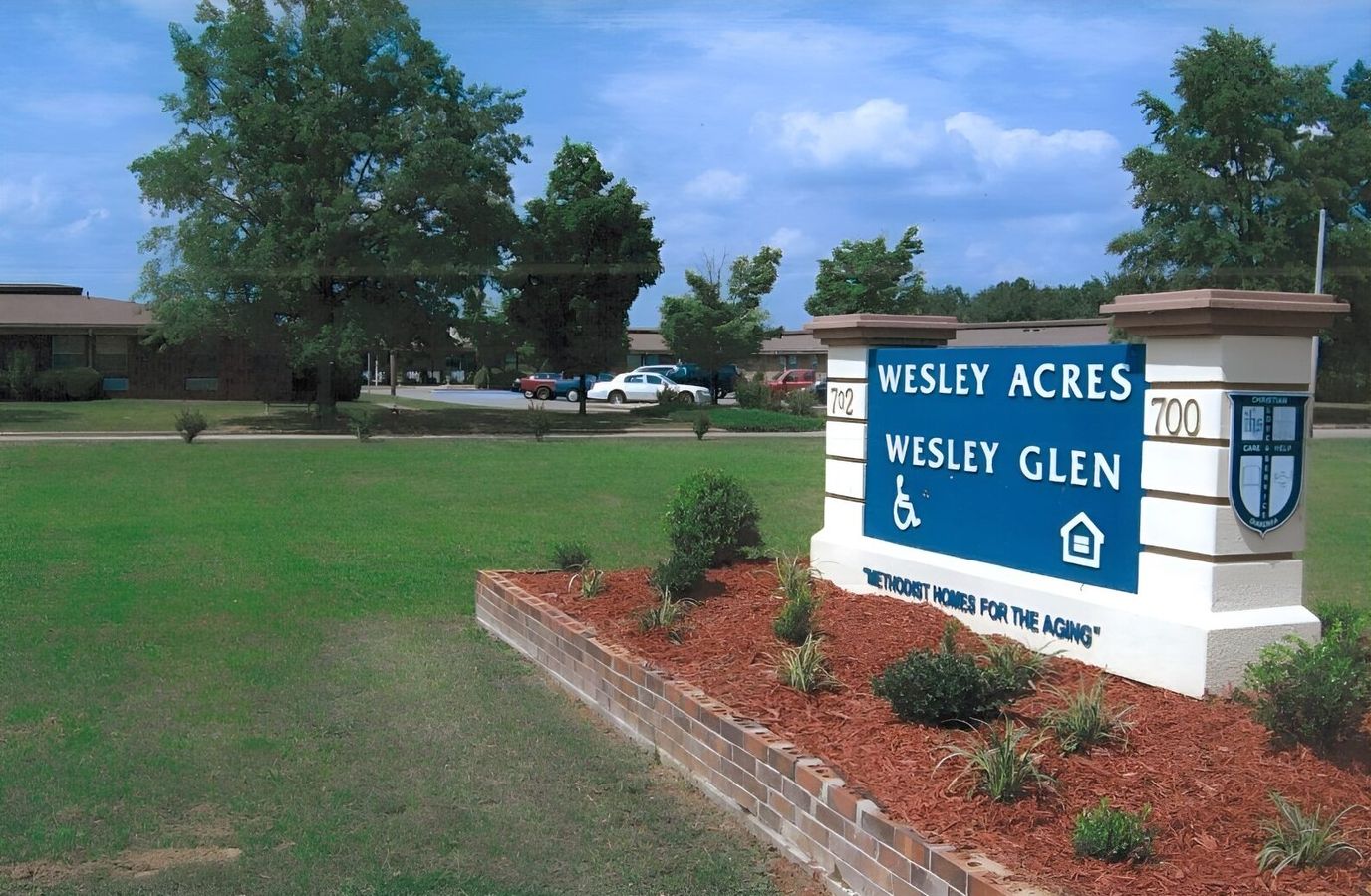 Signage for Wesley Acres and Wesley Glen apartments