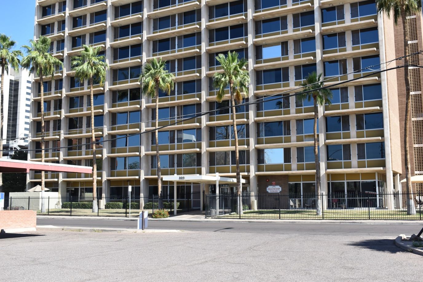 Exterior view of Fellowship Towers with palm trees