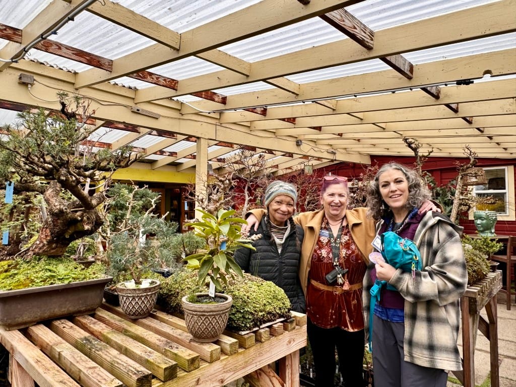 Grace Center For Adult Day Services, memory care in Corvallis, OR — Group of women standing in a garden setting