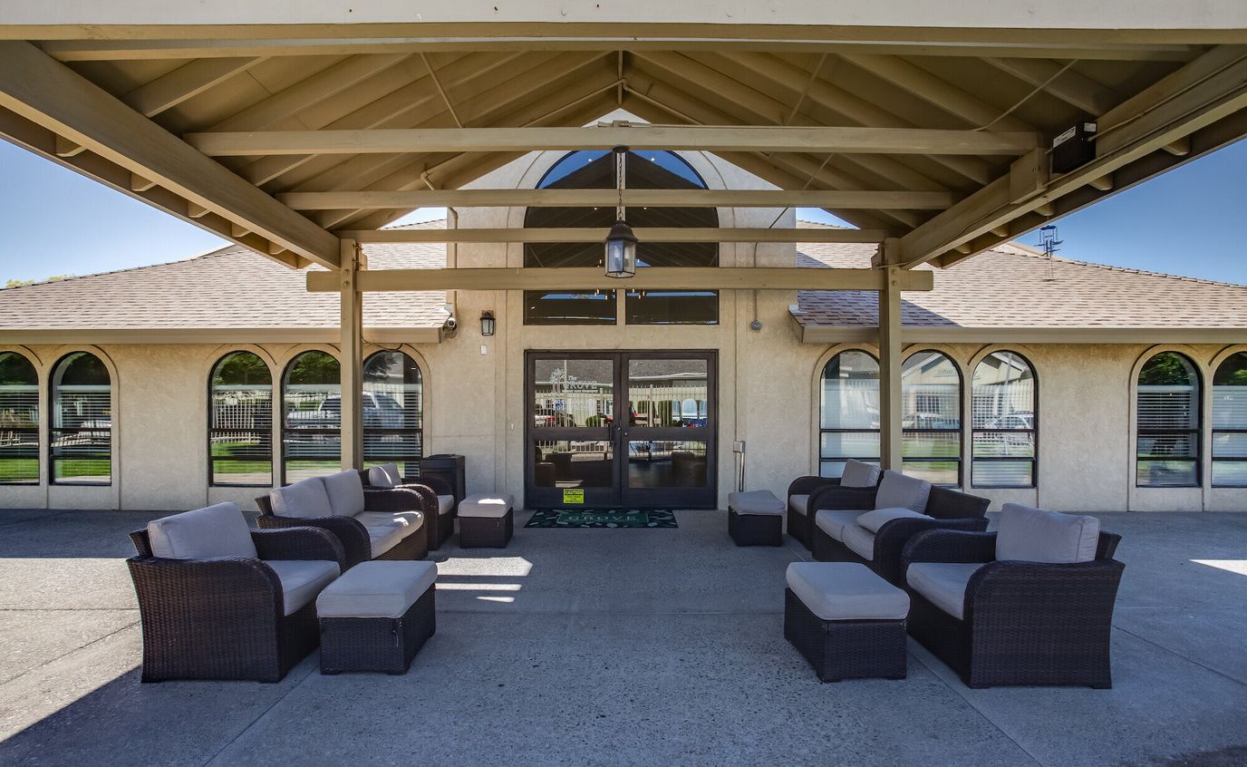 Outdoor seating area with wicker furniture