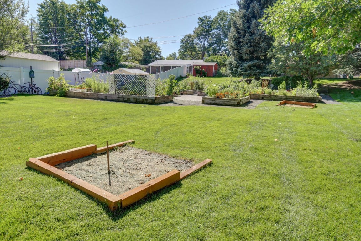Well-maintained garden area with raised planter boxes