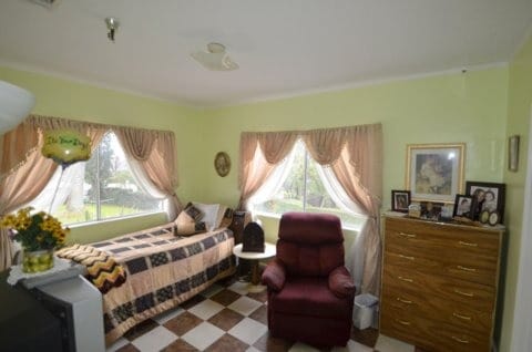 Cozy resident room with natural light and personal touches