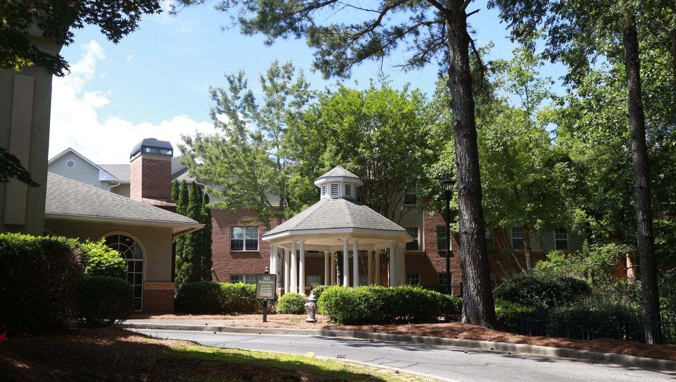 Exterior view of a gazebo and landscaping at the facility