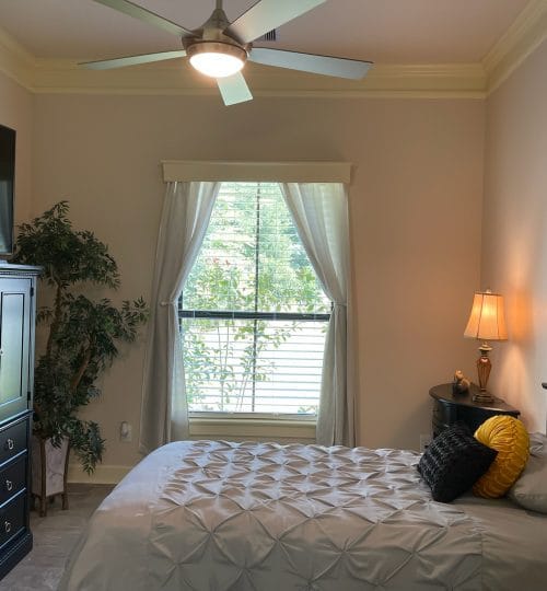 Cozy resident bedroom with a window view