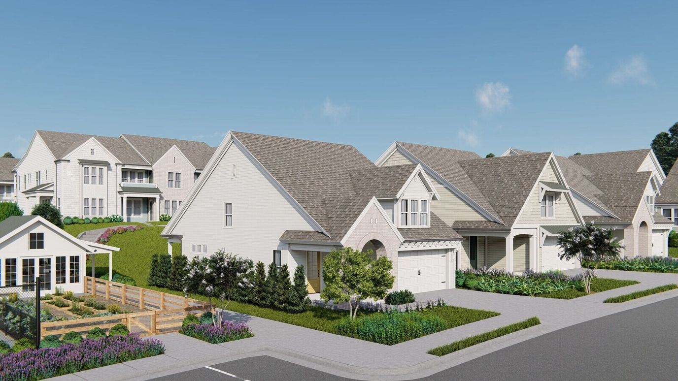 Exterior view of a senior living community with buildings and gardens
