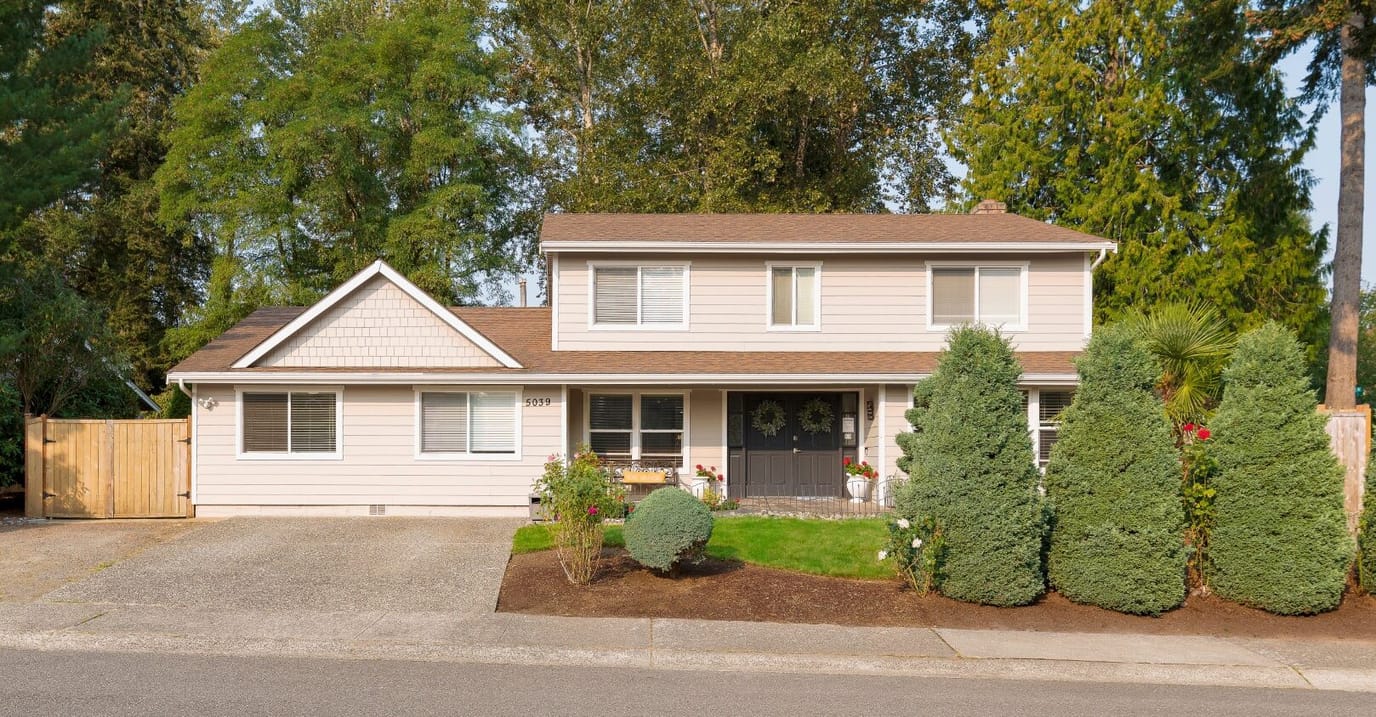 Exterior view of a residential building with landscaping