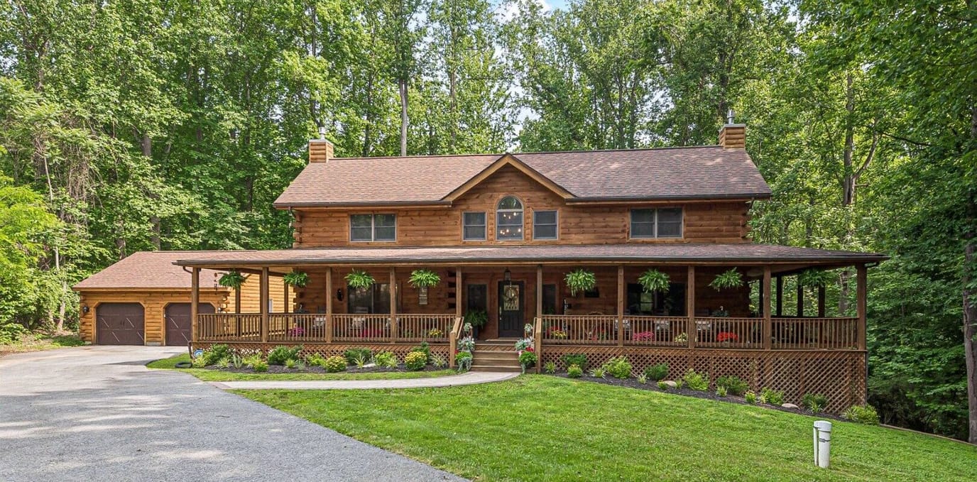 Exterior view of a log cabin-style assisted living facility