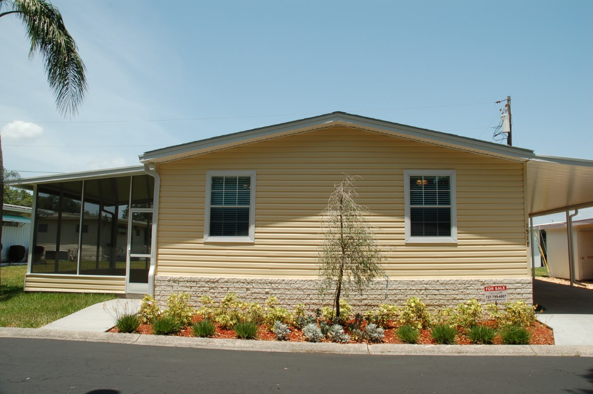 Exterior view of a facility building with landscaping