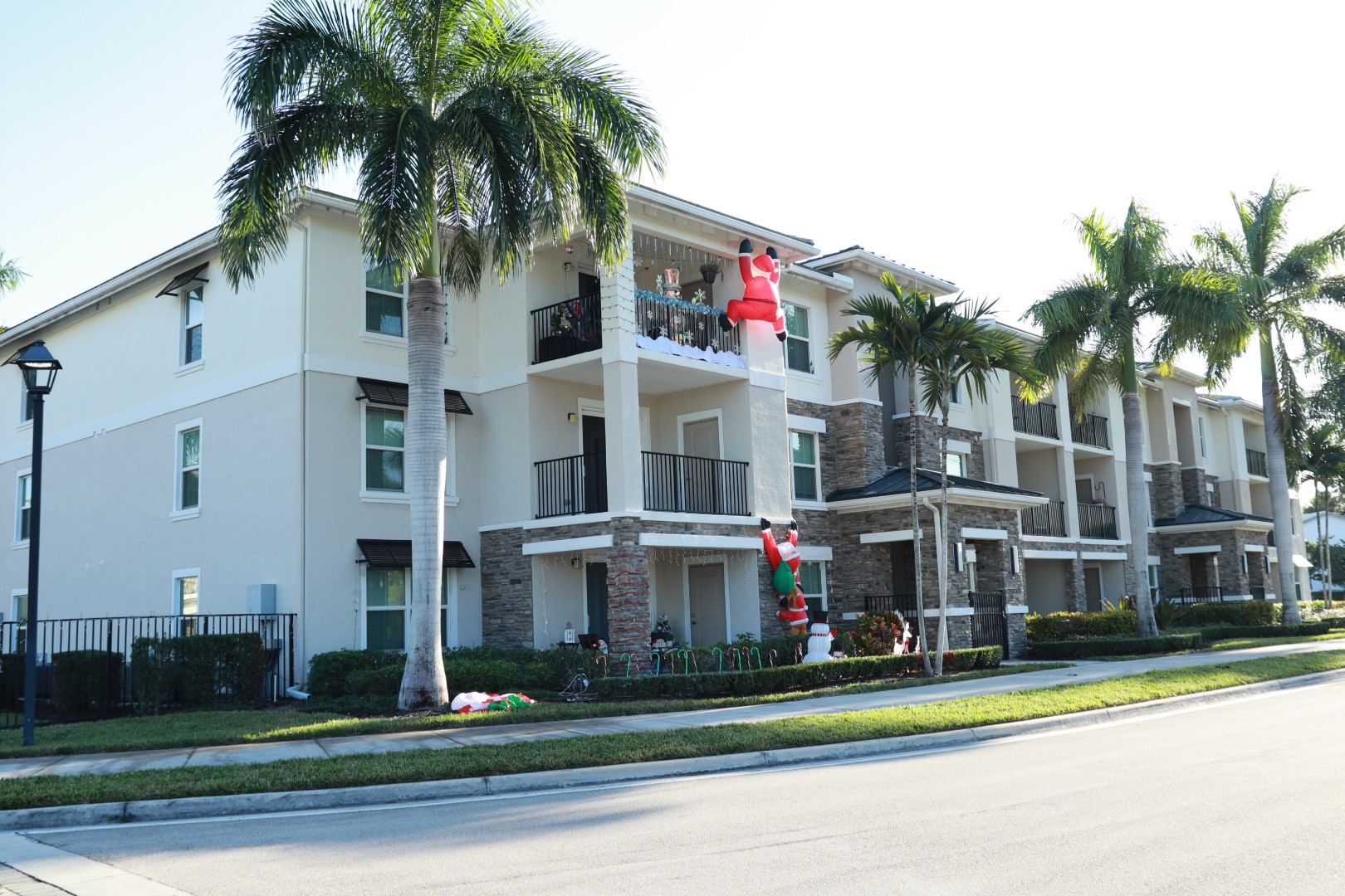 Exterior view of a senior living facility decorated for the holidays