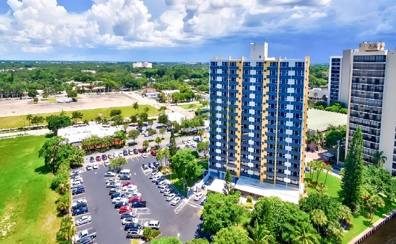 Aerial view of a senior living facility building and surrounding area