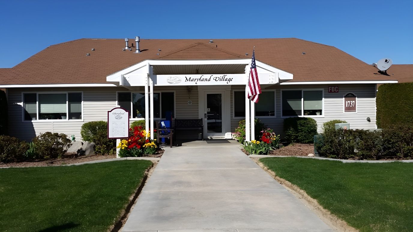 Front entrance of Maryland Village facility with landscaping