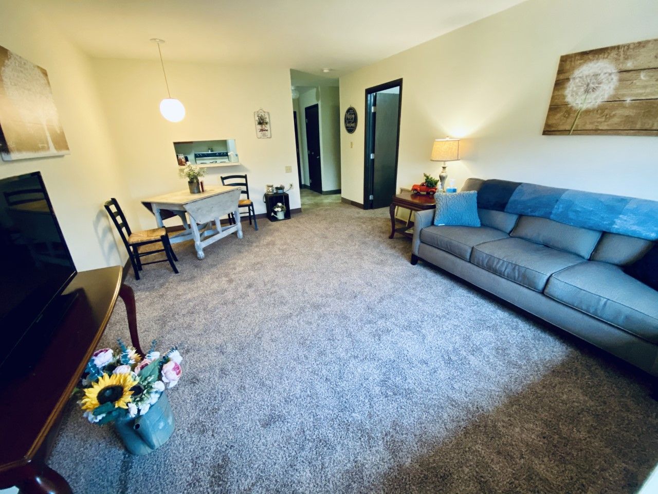 Cozy living area with a couch and dining table