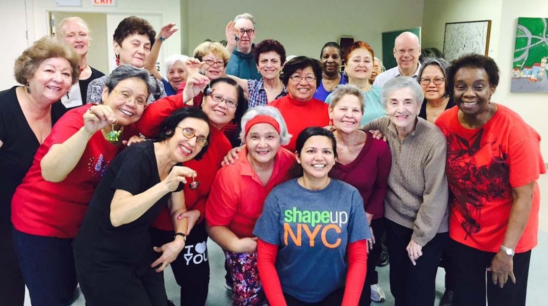 Residents and staff participating in a group activity