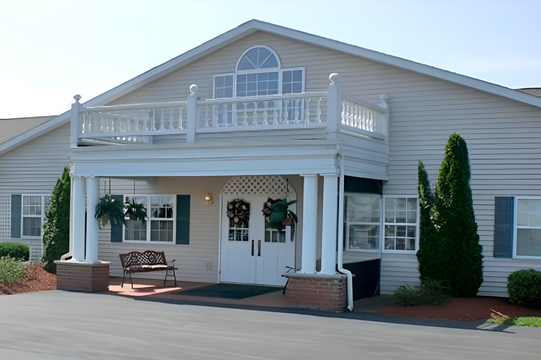 Entrance of a senior living facility with decorative elements
