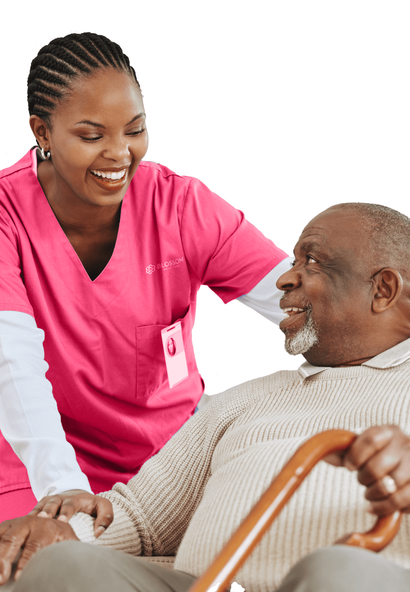 A caregiver interacting joyfully with a senior resident