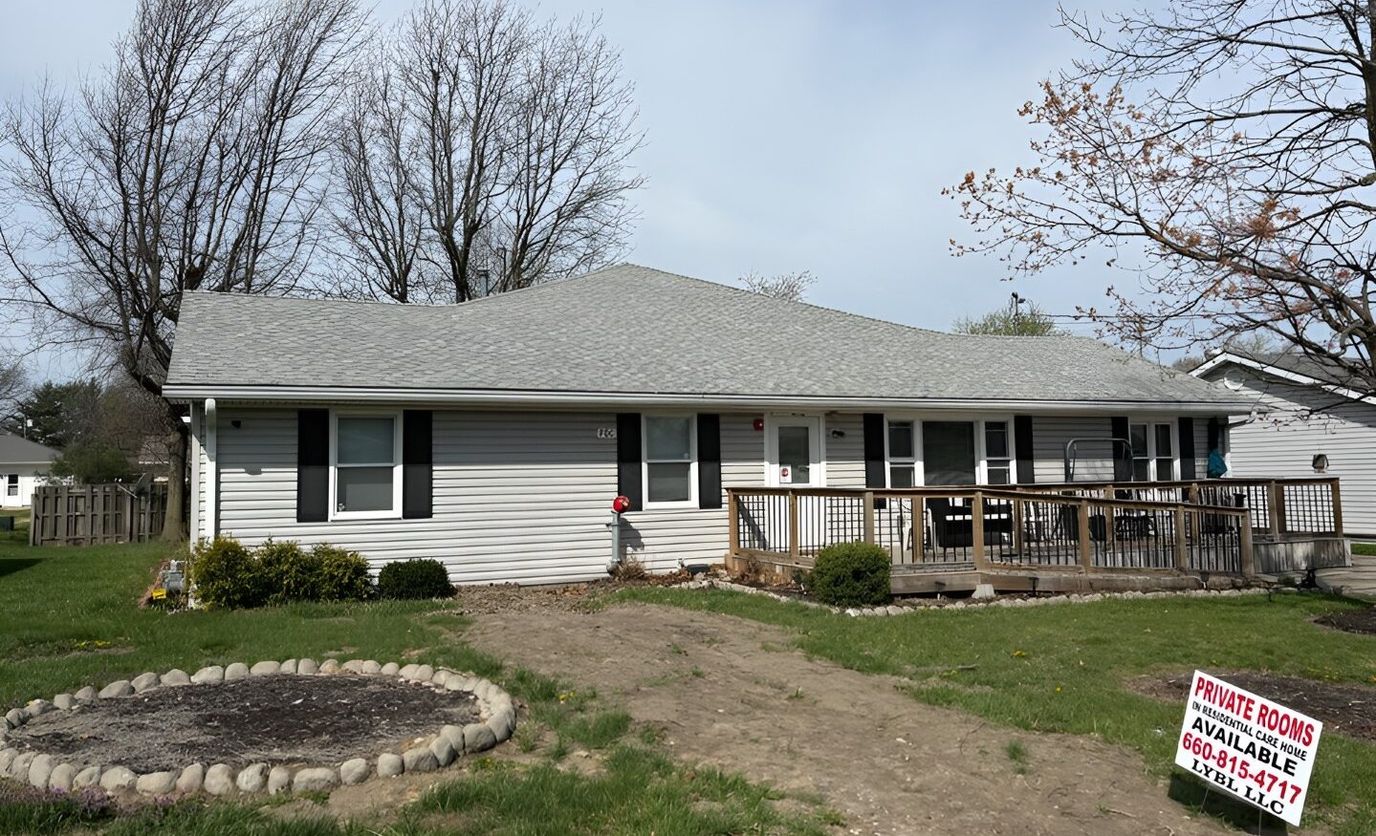 Exterior view of a senior living facility with porch