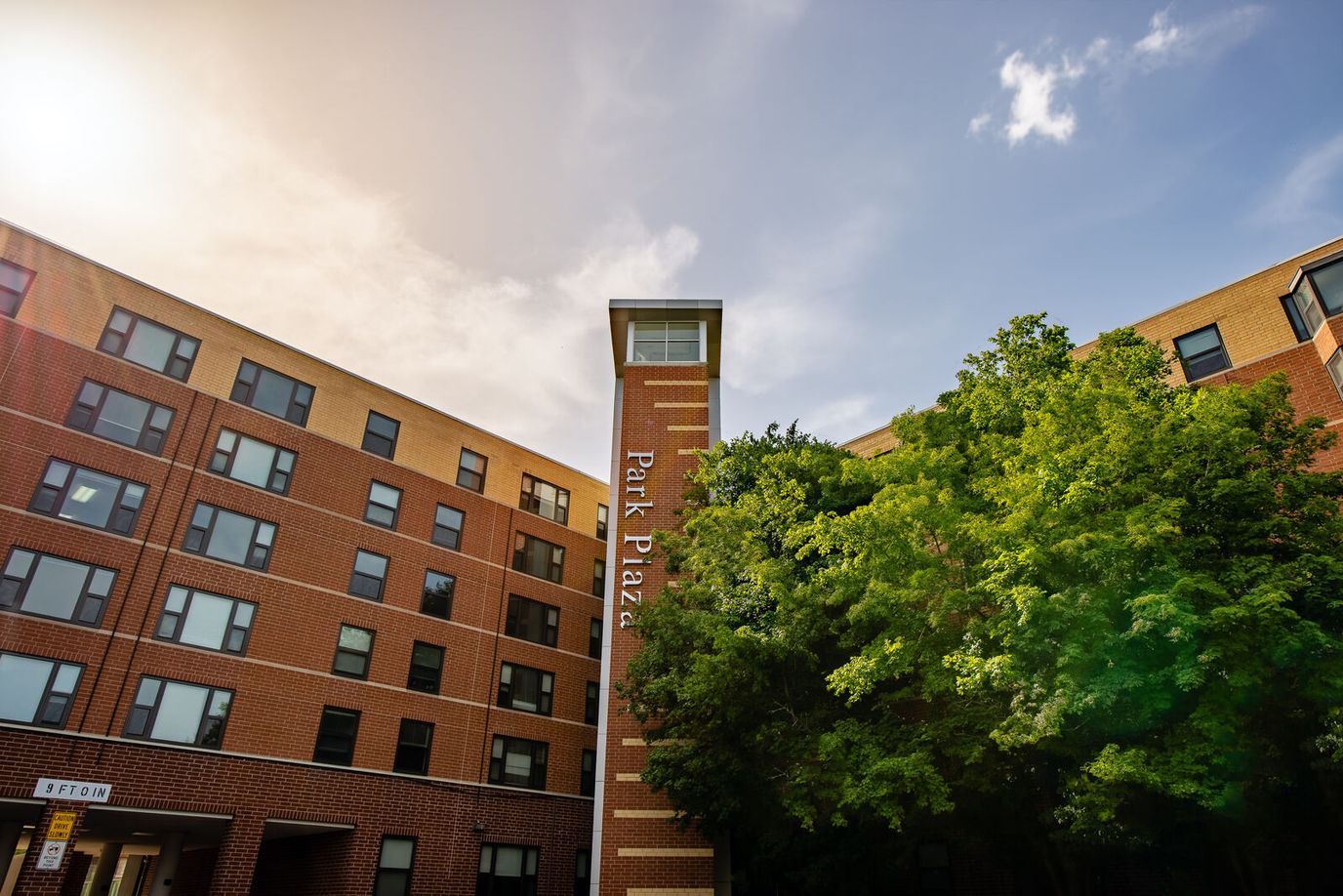 Exterior view of Park Plaza building with trees
