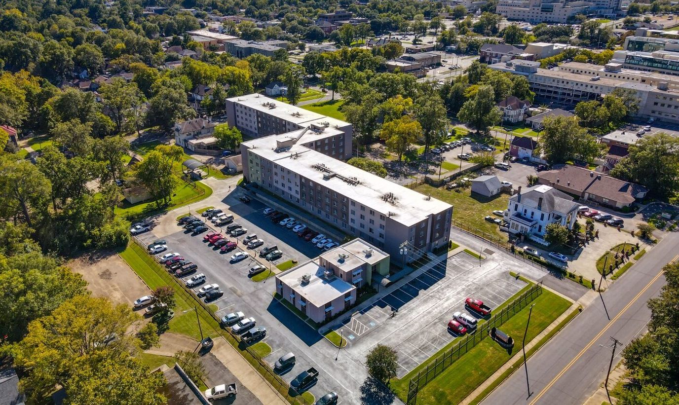 Aerial view of Jordan Square Senior Apartments and parking area