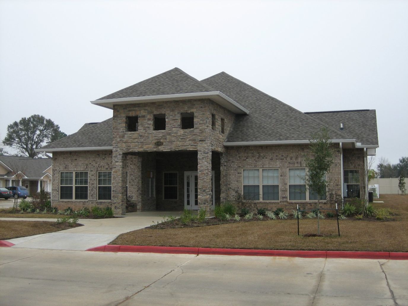 Exterior view of The Villas of Lake Charles facility