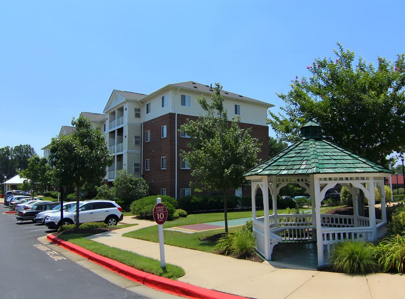 Outdoor view of the senior apartment building with gazebo