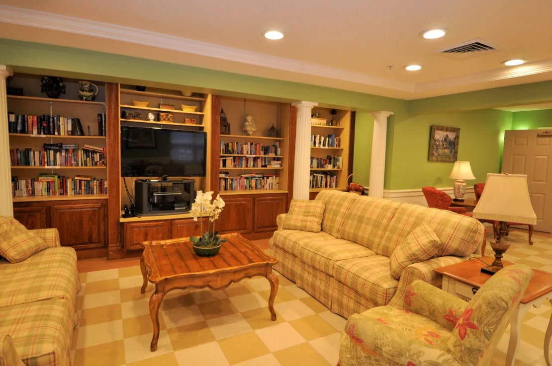 Cozy interior lounge with seating and bookshelves