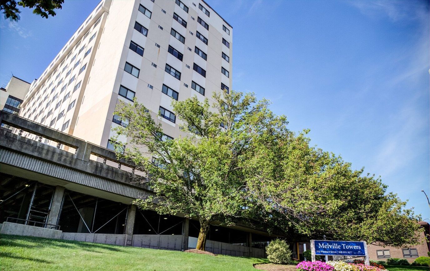 Exterior view of Melville Towers with landscaping