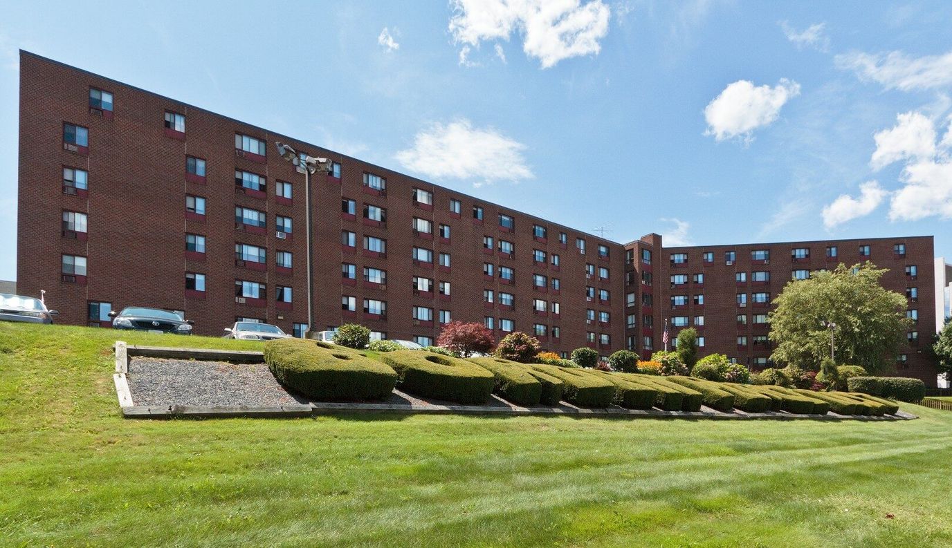 Exterior view of Borden Place with landscaped grounds