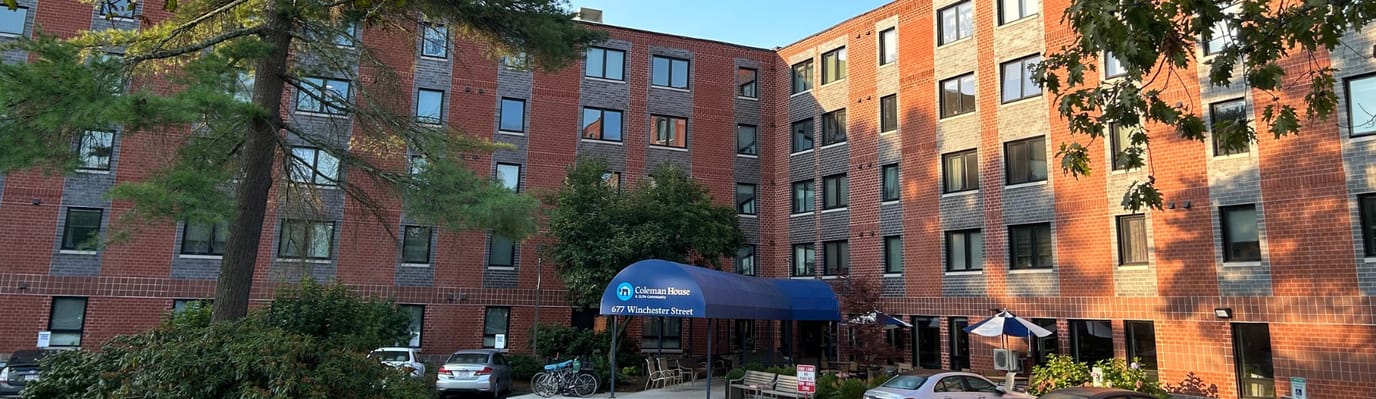 Exterior view of Coleman House with entrance canopy