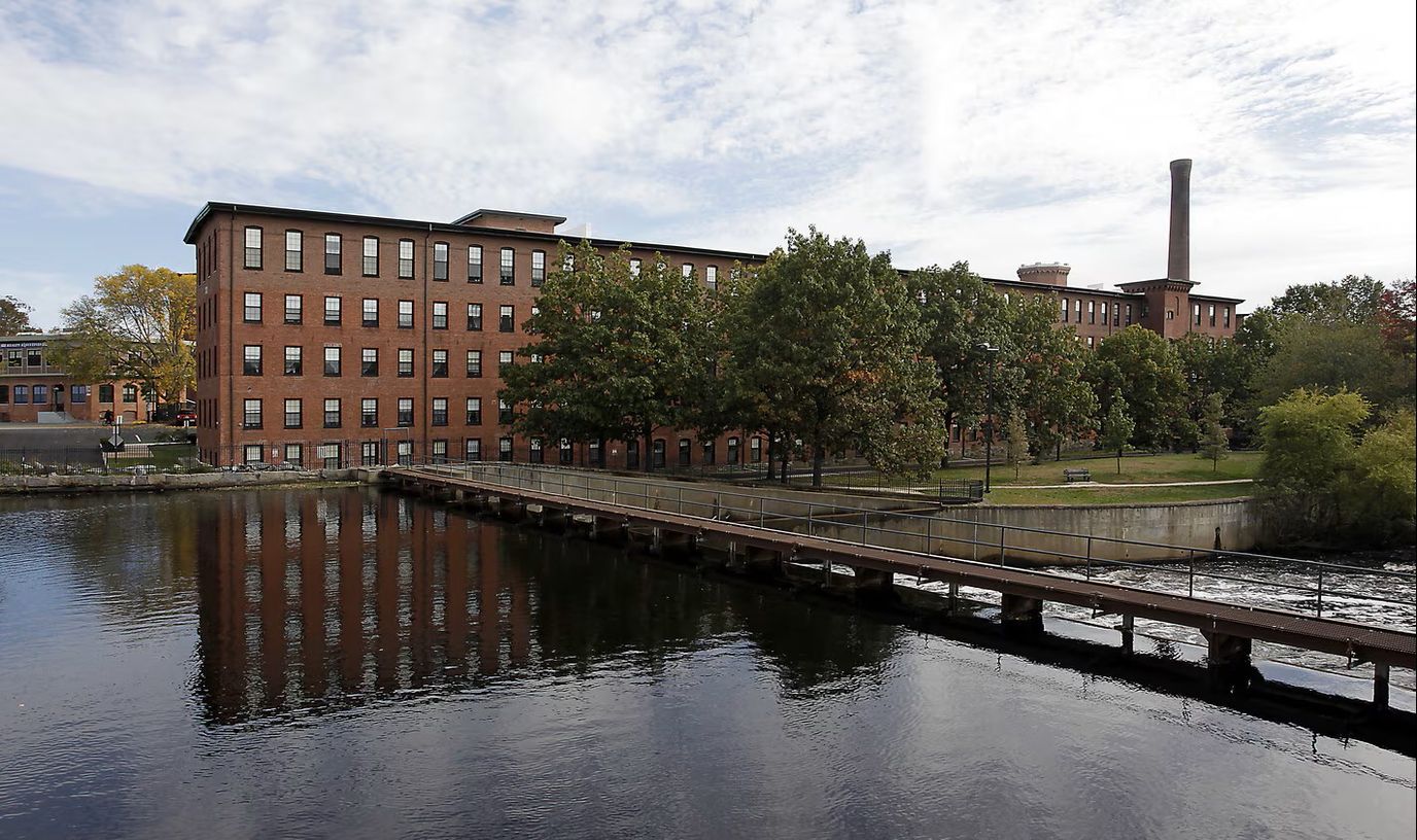 Exterior view of Francis Cabot Lowell Mill by the river